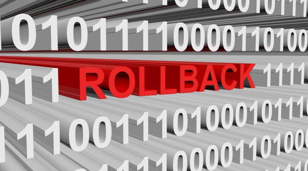 A vector illustration with white ones and zeros and the word "rollback" in red signifying a rollback strategy in Salesforce