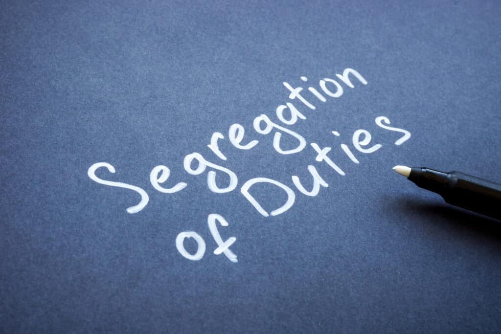 Blue background with in white handwriting “segregation of duties.”